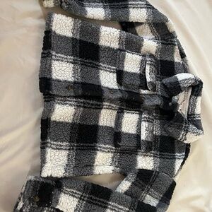 A black and white and gray patterned sweater